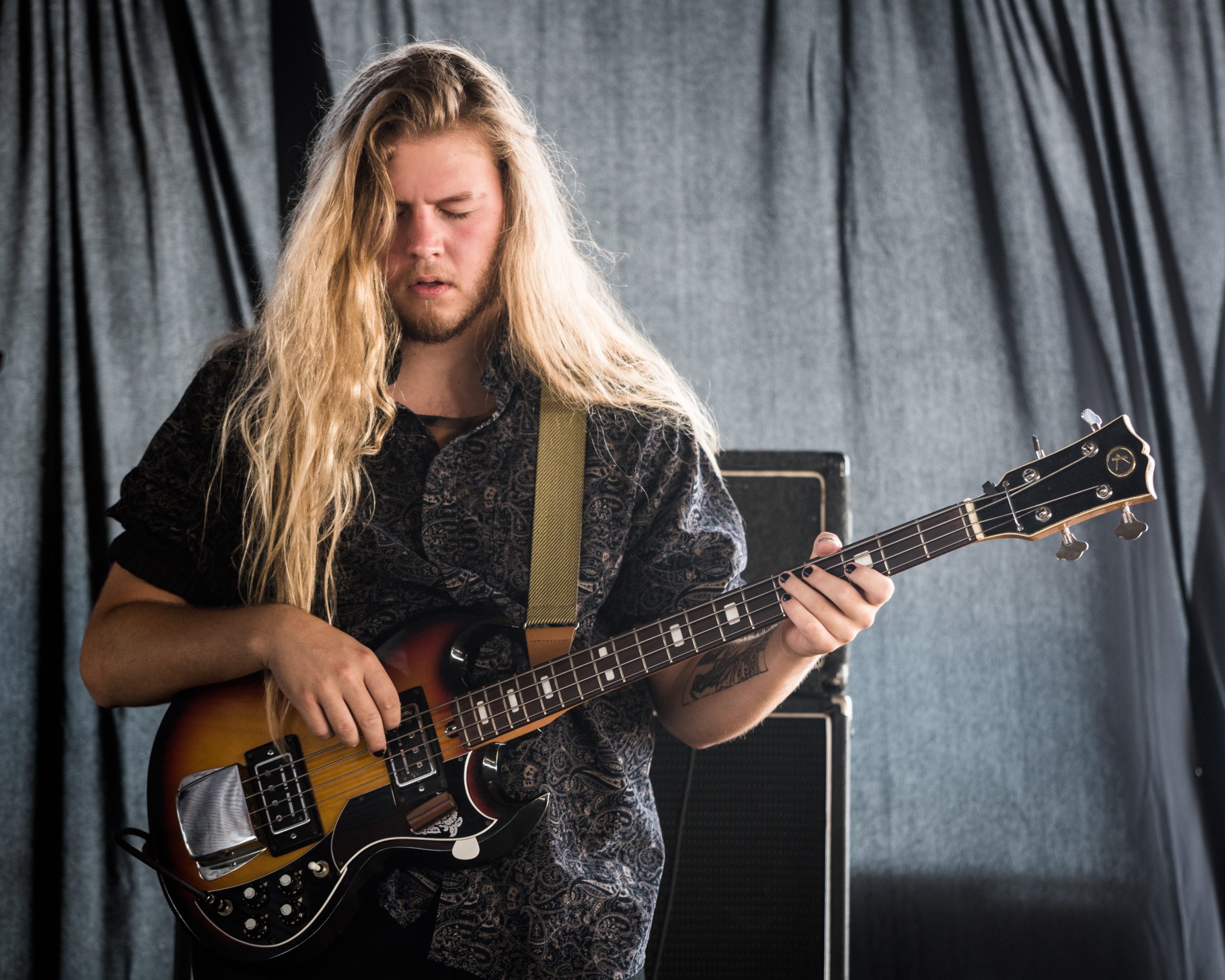 Riley Performing with Viper and the Vertebrae - Photo by Dan Plucinski